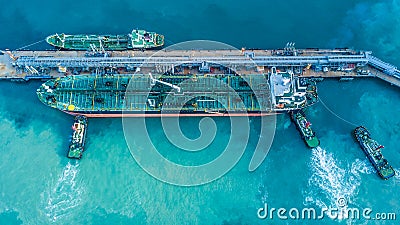 Aerial view shot of crude oil tanker ship anchored at the oil te Stock Photo