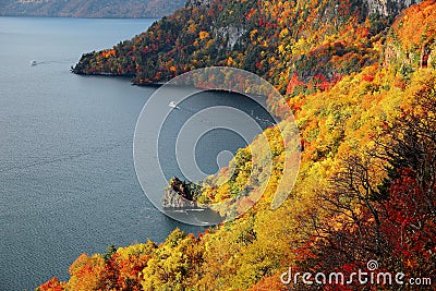 Aerial view of a sightseeing boat on autumn Lake Towada, in Towada Hachimantai National Park, Aomori, Japan Stock Photo