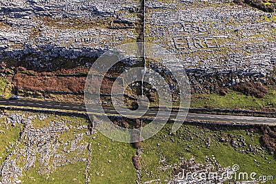 Aerial view on sign Ireland in Irish language 48 EIRE made out of rocks in Burren area. West of Ireland. Popular travel region on Stock Photo