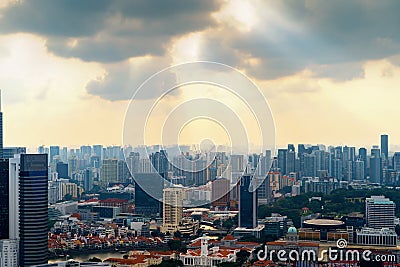 Aerial view of Singapore Downtown skyline at sunset. Financial district and business centers in technology smart urban city in Stock Photo
