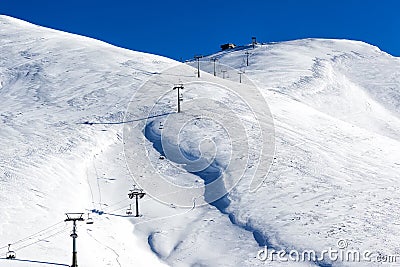 Aerial View of ski lifts over the snowed mountain Stock Photo