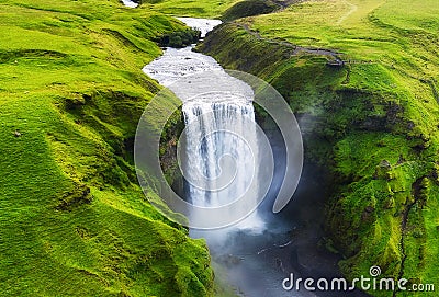 Aerial view on the Skogafoss waterfall in Iceland. Landscape from air. Famous place in Iceland. Stock Photo