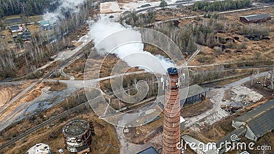 Aerial view smoking chimney of the gas boiler plant. Ecological problem Stock Photo