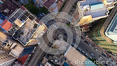 Aerial view of a sprawling cityscape with numerous buildings and a network of roads connecting them Stock Photo