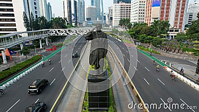 Aerial View of The statue of General Sudirman Patung Jenderal Sudirman on Sudirman road. JAKARTA - Indonesia. May 16, 2021 Editorial Stock Photo