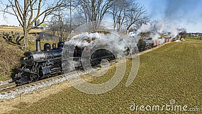 Aerial View of a Steam Double Header Freight and Passenger Train, Traveling Thru Farmlands Editorial Stock Photo