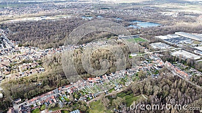Aerial view of suburban homes surrounded by lush vegetation. Antwerp, Belgium. Editorial Stock Photo