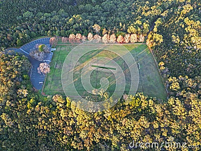 Aerial view of sunrise at a green football field at Wahroonga, NSW, Australia Stock Photo