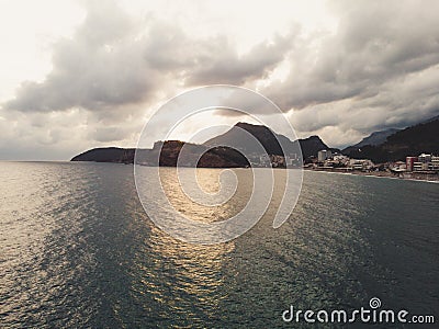 Aerial view sunset Coastline in Montenegro. Lonely beach in Bar Stock Photo