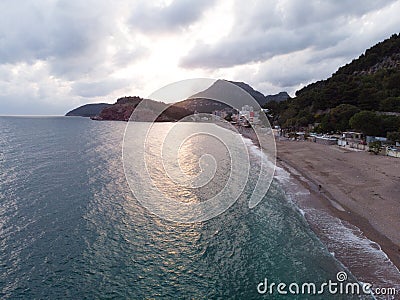 Aerial view sunset Coastline in Montenegro. Lonely beach in Bar Stock Photo