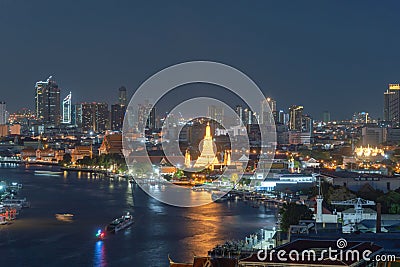 Aerial view of Temple of Dawn or Wat Arun of Chao Phraya River, Bangkok, Thailand in Rattanakosin Island in architecture, Urban Stock Photo