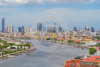 Aerial view of Temple of Dawn or Wat Arun of Chao Phraya River, Bangkok, Thailand in Rattanakosin Island in architecture, Urban Stock Photo