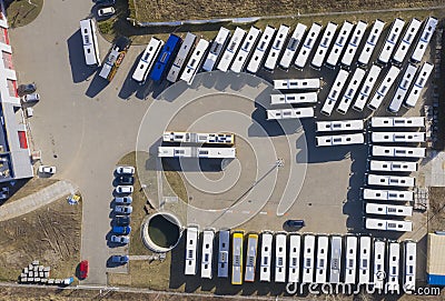 Aerial view to parking lot for autobus and trucks. Industrial background on transportation theme Stock Photo