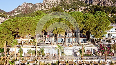 Aerial view of tourist hotel with with planted pines in resort village Turunc in Turkey. Hotel on the first line to the Editorial Stock Photo