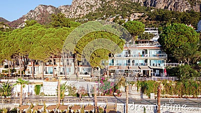 Aerial view of tourist hotel with with planted pines in resort village Turunc in Turkey. Hotel on the first line to the Editorial Stock Photo