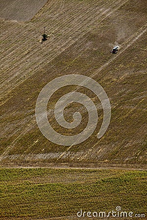 Aerial view tractor plowing Stock Photo