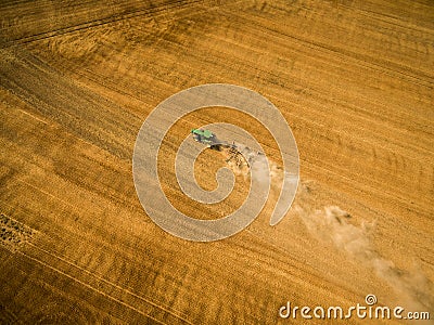 Aerial view of a tractor working a field Editorial Stock Photo