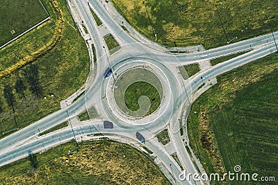 Aerial view of traffic circle roundabout road junction, top view Stock Photo