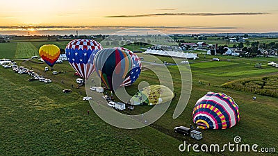 Aerial View on Two Hot Air Balloons Launching, in the Early Morning, From a Field in Rural America Editorial Stock Photo