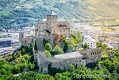 Aerial view of Valere Basilica with dramatic sunset light in Sion Switzerland Stock Photo