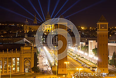 Aerial view of venetian columns, National Art Museum and Placa Espanya in Barcelona at night, Catalonia, Spain Stock Photo