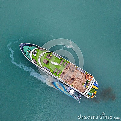 Aerial view of a Vietnamese boat in Halong bay when oil spill in the sea. Ecological background. Environmental pollution Editorial Stock Photo