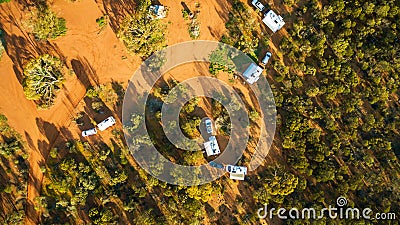 Aerial view of 4WD`s and caravans camped for the night in the outback of Australia Stock Photo