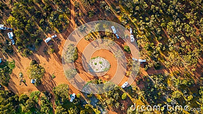 Aerial view of 4WD`s and caravans camped for the night in the outback of Australia Stock Photo