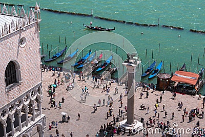 Aerial view of Winged Lion Column and Gondola in venice - Italy Editorial Stock Photo