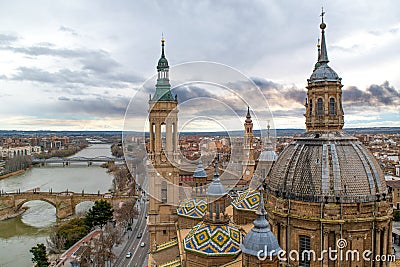 Aerial view of Zaragoza cityscape, with the Puente de Piedra and Puente de Hierro bridges, the Ebro river from the tower of Stock Photo