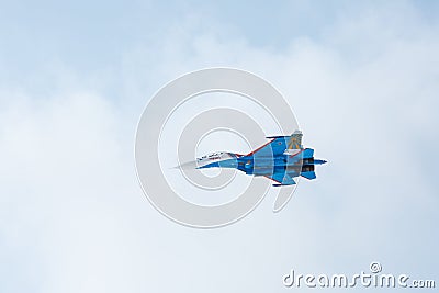 Aerobatics performed by aviation group of aerobatics Military-air forces Russian Knights on planes Su-27 Editorial Stock Photo