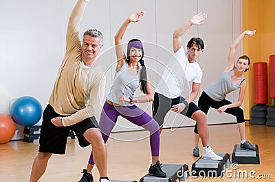 Aerobic exercises at gym Stock Photo