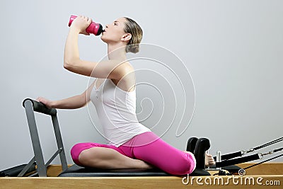 Aerobic gym pilates woman rest drinking water Stock Photo