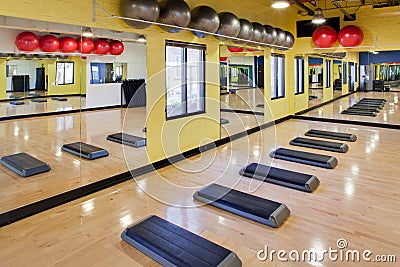 Aerobic steps in gym Stock Photo