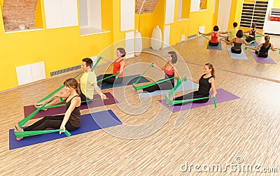 Aerobics pilates group with rubber bands Stock Photo
