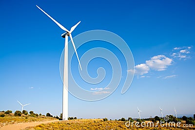 Aerogenerator wind mill in sunny blue sky Stock Photo