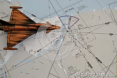 Aeronautical chart, known as IFR flight chart, with miniature steel jet aircraft Editorial Stock Photo