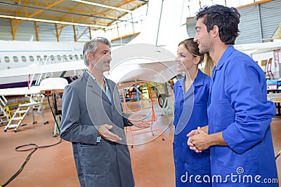 Aeronautical engineers students and teacher Stock Photo