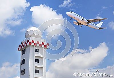 Aeronautical meteorological station tower or weather radar dome station tower with passenger airplane jet taking off Stock Photo