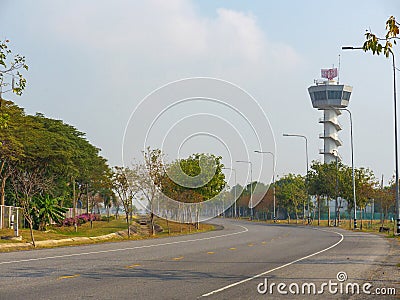 Aeronautical radio tower beside curve road in airport area Stock Photo