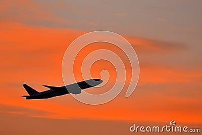 Aeroplane with beautiful sunset Stock Photo