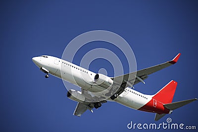 Aeroplane in blue sky Stock Photo