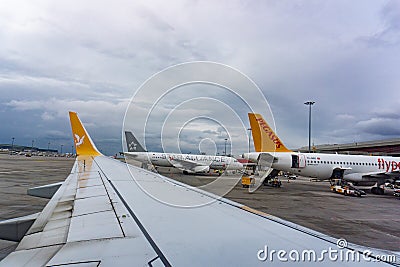 Aeroplane of Pegasus Airlines taxiing in Istanbul Sabiha Gokcen International Airport in the early morning Editorial Stock Photo