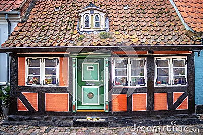 Aeroskobing, Denmark - Old, Traditional Half-Timbered House on a Quaint Street Stock Photo