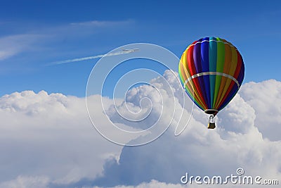 Aerostat floating in day sky. Mixed media Stock Photo