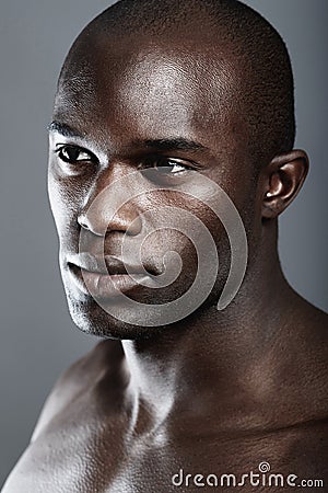 Aesthetic, beauty and face black man on dark background with muscle, motivation for fit and serious person. Health, art Stock Photo