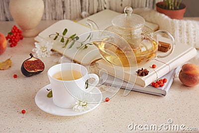 Aesthetic brunch of tea time, herbal tea and figs, peaches. Sweet desserts, natural herbal tea - natural sustainable eco Stock Photo