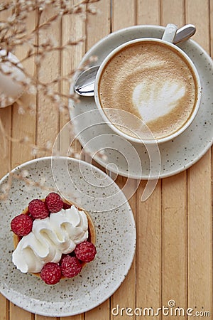Aesthetic french raspberry tart and cup of cappuccino. Atmospheric breakfast flat lay. Stock Photo