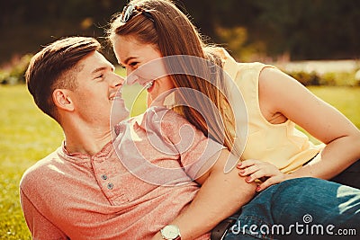 Affectionate couple on grass. Stock Photo