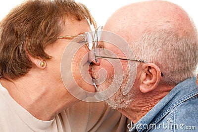 Affectionate Senior Couple Kissing Stock Photo